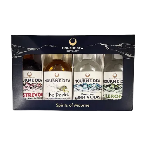 Four bottles of Mourne Dew spirits in a decorative box on a white background