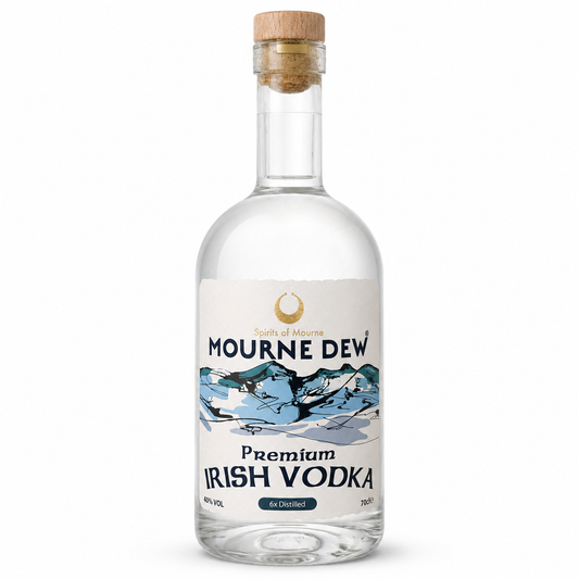 A bottle of Mourne Dew Premium Irish Vodka on a clean white background. The clear glass bottle features a white label with a blue and white mountain illustration and a cork stopper.